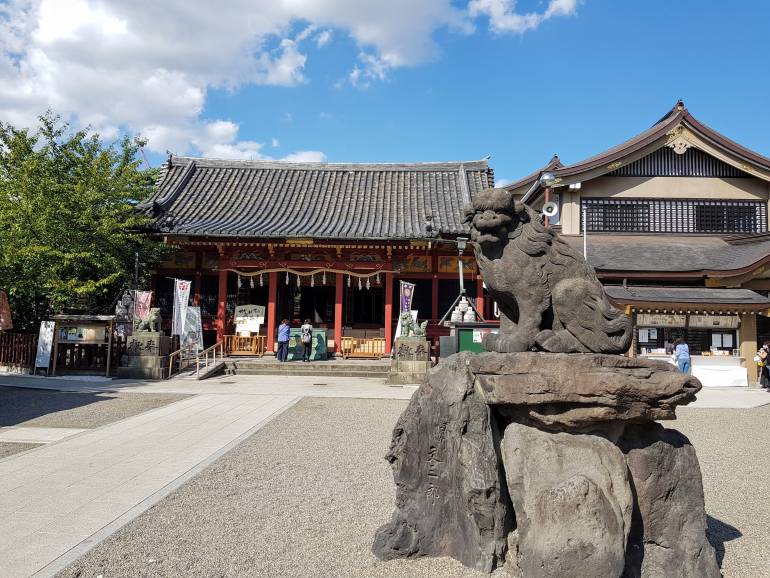 Asakusa Shrine and guard dog statue
