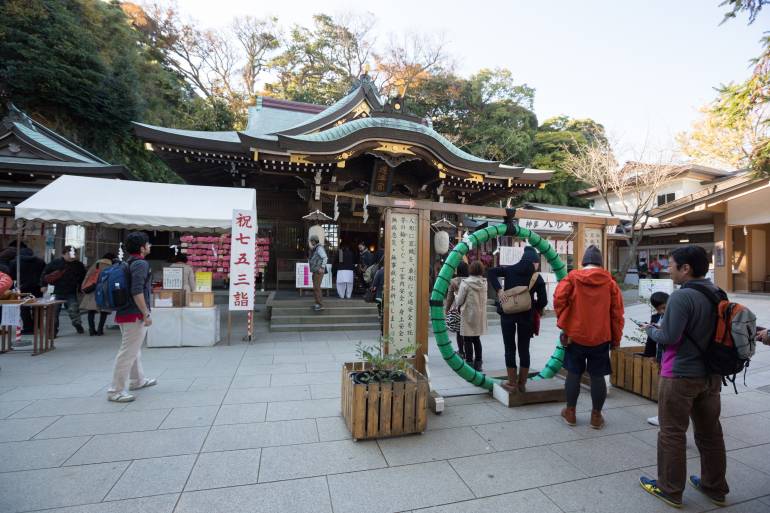 People at Enoshima Shrine in Enoshima, Fujisawa, Kanagawa Prefecture, Japan. The shrine is dedicated to the worship of the Benten.