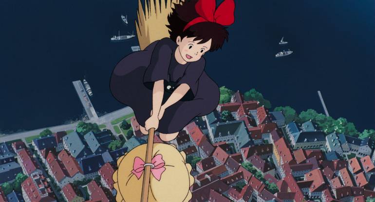 A girl flying on a broom