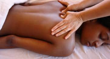 Young woman getting a deep tissue massage