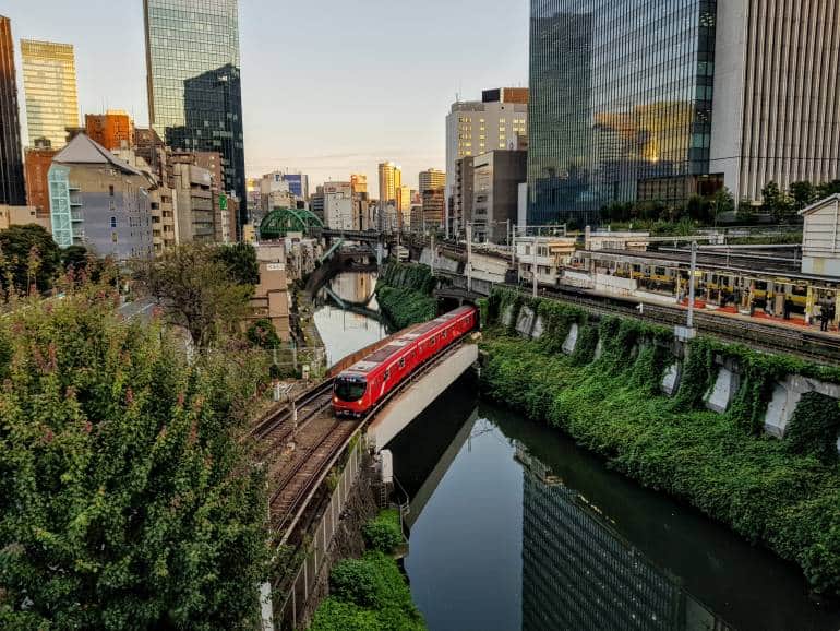 Marunouchi Line train emerges onto bridge over the Kanda River next to Ochanomizu Station