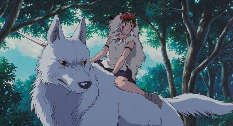 A girl in a fur outfit sitting on a giant white wolf